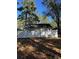 House exterior back view with white vinyl fence at 6424 Spice Bush Crescent, Myrtle Beach, SC 29588