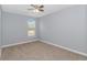 Simple bedroom with neutral walls and carpet flooring at 695 Iredel Ct., Calabash, NC 28467