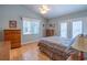 Main bedroom with wood floors and access to a private deck at 903 Knoll Dr., Little River, SC 29566