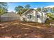 House exterior with side yard view at 903 Knoll Dr., Little River, SC 29566