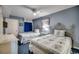 Guest bedroom with two twin beds and coastal decor at 1003 S Ocean Blvd. # 505, North Myrtle Beach, SC 29582