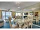 Bright dining area with glass table and ocean view at 1003 S Ocean Blvd. # 505, North Myrtle Beach, SC 29582