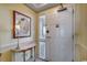 Inviting entryway with a console table and mirror at 1003 S Ocean Blvd. # 505, North Myrtle Beach, SC 29582