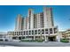 Coastal condo building with parking and ocean views at 1003 S Ocean Blvd. # 505, North Myrtle Beach, SC 29582