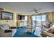 Bright living room with ocean view and comfy seating at 1003 S Ocean Blvd. # 505, North Myrtle Beach, SC 29582