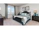 Spacious bedroom with water views and modern furnishings at 1493 Nokota Dr., Conway, SC 29526