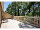 A wooden deck with golf course views and two lounge chairs at 3015 Old Bryan Dr. # 17-7, Myrtle Beach, SC 29577