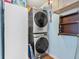 Stackable washer and dryer in a small laundry room at 310 Marsh Pl. # 312, Murrells Inlet, SC 29576