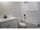 Clean bathroom with white vanity, tub, and subway tile at 3133 Tiger Tail Rd., Conway, SC 29526