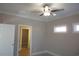 Bright bedroom with ceiling fan and access to bathroom at 3133 Tiger Tail Rd., Conway, SC 29526