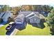 Aerial view of house with a driveway and green lawn at 319 Rice Mill Dr., Myrtle Beach, SC 29588