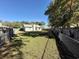 Large backyard with chain link fence and green lawn at 319 Rice Mill Dr., Myrtle Beach, SC 29588