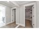 Large walk-in closet with custom shelving and mirrored doors at 331 Happy Valley Dr., Myrtle Beach, SC 29588