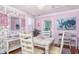 Charming dining room with floral wallpaper and white table at 332 N Congdon St., Georgetown, SC 29440