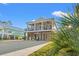 Two-story home with front porch, balcony, and elevated design at 355 Oak Ave., Murrells Inlet, SC 29576