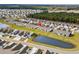 Aerial view of home and neighborhood near pond at 4036-D Taranto Loop # 5404-D, Myrtle Beach, SC 29579