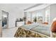 Main bedroom with king bed, access to the bathroom, and a view at 4036-D Taranto Loop # 5404-D, Myrtle Beach, SC 29579