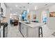 Modern kitchen with island, stainless steel appliances and view to dining area at 4036-D Taranto Loop # 5404-D, Myrtle Beach, SC 29579