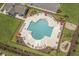 Community pool with surrounding lounge chairs and umbrellas at 4036-D Taranto Loop # 5404-D, Myrtle Beach, SC 29579