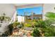 Relaxing screened porch with colorful plants and backyard access at 4036-D Taranto Loop # 5404-D, Myrtle Beach, SC 29579