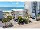 Aerial view of beachfront condo building with ocean and pool views at 4305 S Ocean Blvd. # 302, North Myrtle Beach, SC 29582