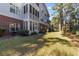 Brick building with screened porch and wooded backdrop at 4818 Innisbrook Ct. # 603, Myrtle Beach, SC 29579