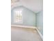 Spacious bedroom with light walls, carpeting, and a large window at 5619 South Blackmoor Dr., Murrells Inlet, SC 29576