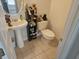 Small half bathroom with pedestal sink and toilet at 6203 Catalina Dr. # 2412, North Myrtle Beach, SC 29582