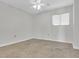 Simple bedroom with tile flooring and ceiling fan at 9400 Shore Dr. # 317, Myrtle Beach, SC 29572