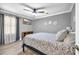 Serene bedroom with gray walls, a ceiling fan, and plenty of natural light at 1014 Thomas Ave., North Myrtle Beach, SC 29582