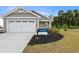 Exterior of charming craftsman style home with two car garage at 1028 Oak Meadow Dr., Conway, SC 29526
