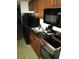 Small kitchen with granite countertop, black appliances at 1200 N Ocean Blvd. # 307, Myrtle Beach, SC 29577