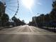 Street view with palm trees and the Ferris wheel in the background at 1200 N Ocean Blvd. # 307, Myrtle Beach, SC 29577