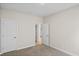 Well-lit bedroom featuring carpet flooring and access to other rooms at 1228 Needle Grass Loop, Myrtle Beach, SC 29579