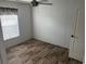 Bedroom with ceiling fan and wood-look floors at 1412 Seagull Blvd., North Myrtle Beach, SC 29582