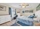 Bright bedroom with a king-size bed and built-in workspace at 1708-B Edge Dr., North Myrtle Beach, SC 29582