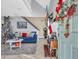 Cozy living room featuring a blue sofa and Christmas decor at 1708-B Edge Dr., North Myrtle Beach, SC 29582