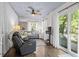 Relaxing sunroom with comfy seating and plenty of natural light at 1760 Barrister Lane, Myrtle Beach, SC 29577