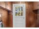 Laundry area with wood paneling and exterior access at 1905 Fulmer St., Conway, SC 29526