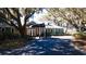 Community clubhouse entrance with landscaping and a covered awning at 1969 Governors Landing Rd. # 224, Murrells Inlet, SC 29576