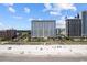 Aerial view of oceanfront resort building and beach at 2000 N Ocean Blvd. # 315, Myrtle Beach, SC 29577