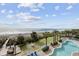 Oceanfront view from above the pool area, including lounge chairs and a hammock at 2000 N Ocean Blvd. # 315, Myrtle Beach, SC 29577