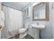 Clean bathroom with pedestal sink and shower/tub combo at 209 North Hillside Dr. # 201, North Myrtle Beach, SC 29582