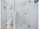 Modern bathroom with a walk-in shower and toilet at 209 North Hillside Dr. # 201, North Myrtle Beach, SC 29582