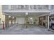 Ground level entrance with double doors and rocking chairs at 209 North Hillside Dr. # 201, North Myrtle Beach, SC 29582