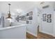 Long hallway with wall art and lots of natural light at 209 North Hillside Dr. # 201, North Myrtle Beach, SC 29582