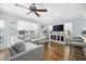 Relaxing living room with hardwood floors, comfortable sofas, and a ceiling fan at 209 North Hillside Dr. # 201, North Myrtle Beach, SC 29582