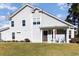 Gray two-story house with a front porch and landscaped yard at 2400 Kings Bay Dr. # 2400, North Myrtle Beach, SC 29582