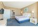 King bed, TV, and access to bathroom at 300 N Ocean Blvd. # 1628, North Myrtle Beach, SC 29582