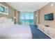 Main bedroom with a king bed and ocean view at 300 N Ocean Blvd. # 1628, North Myrtle Beach, SC 29582